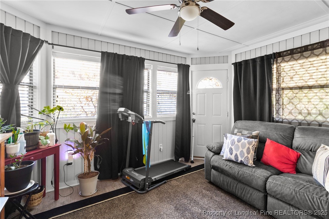 1912 Havilah Road Fayetteville, NC 28303 - Photo 11 of 21 a living room with furniture and a flat screen tv