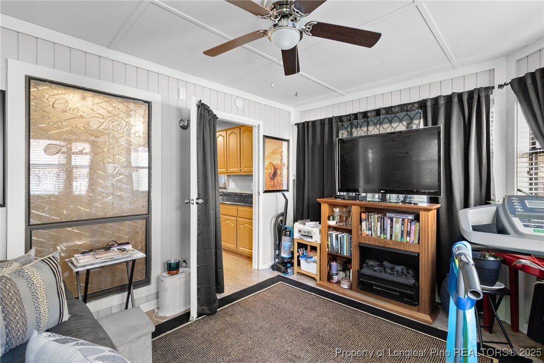 1912 Havilah Road Fayetteville, NC 28303 - Photo 12 of 21 a living room with furniture and a flat screen tv