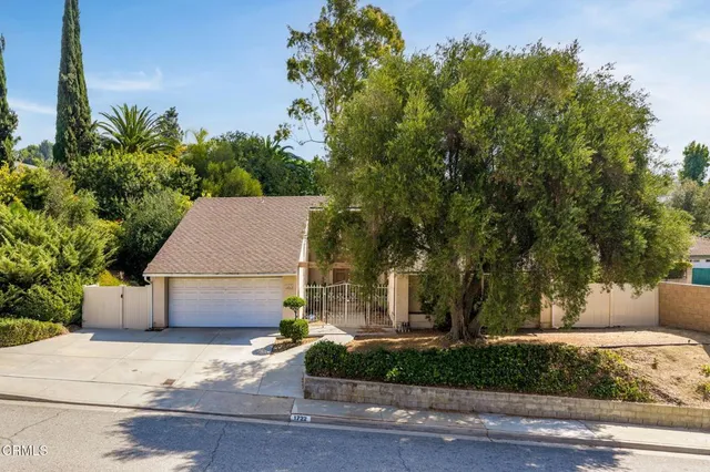 a house view with a outdoor space