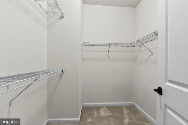 a view of small space with racks on the wall