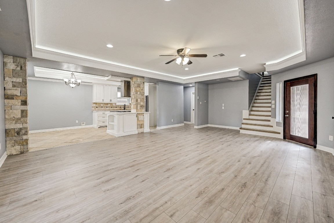 3306 Gary Lane Spring, TX 77380 - Photo 12 of 49 a view of a livingroom with wooden floor and staircase