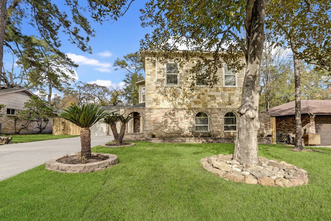 3306 Gary Lane Spring, TX 77380 - Photo 2 of 49 a view of a building with a yard