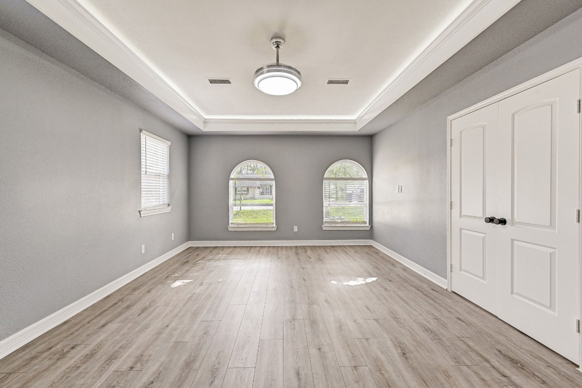 3306 Gary Lane Spring, TX 77380 - Photo 21 of 49 an empty room with wooden floor and windows