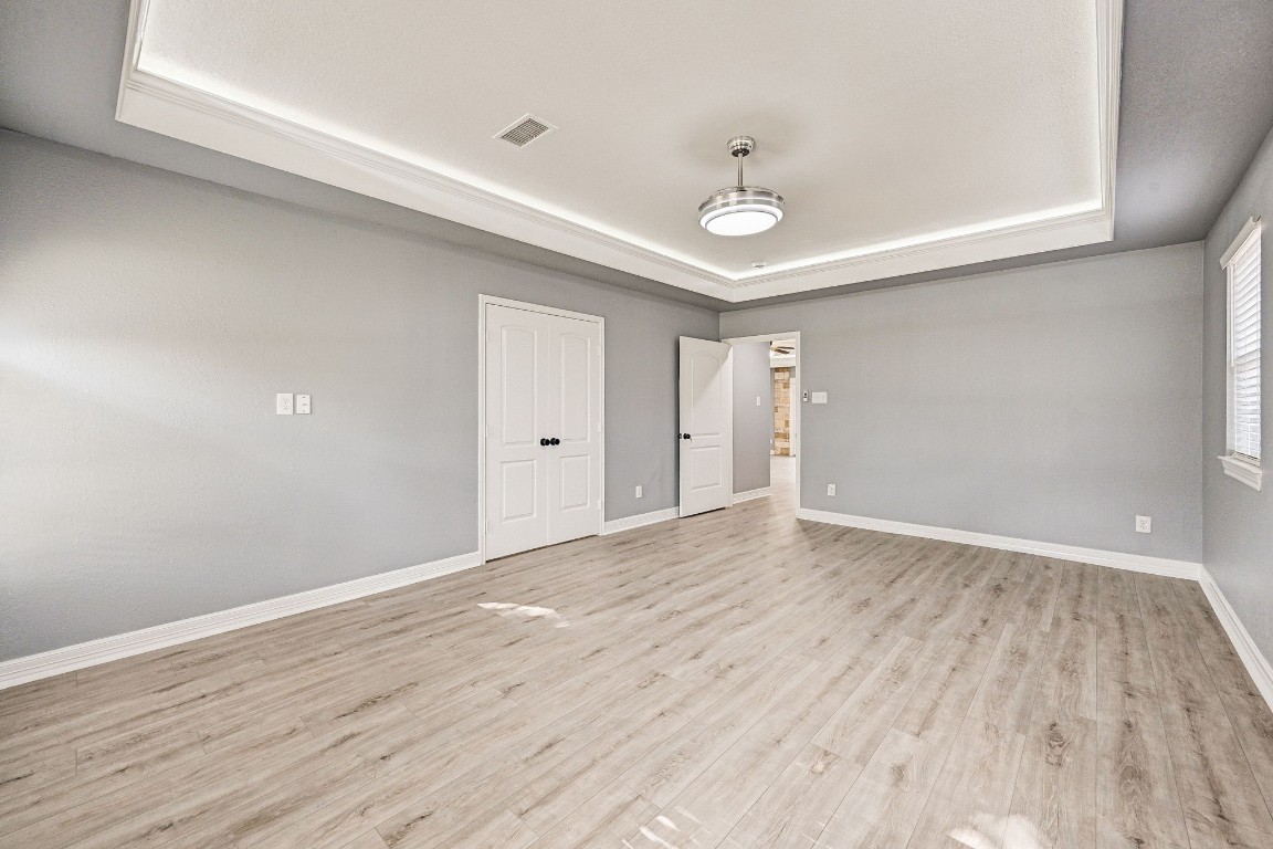 3306 Gary Lane Spring, TX 77380 - Photo 22 of 49 an empty room with wooden floor and windows