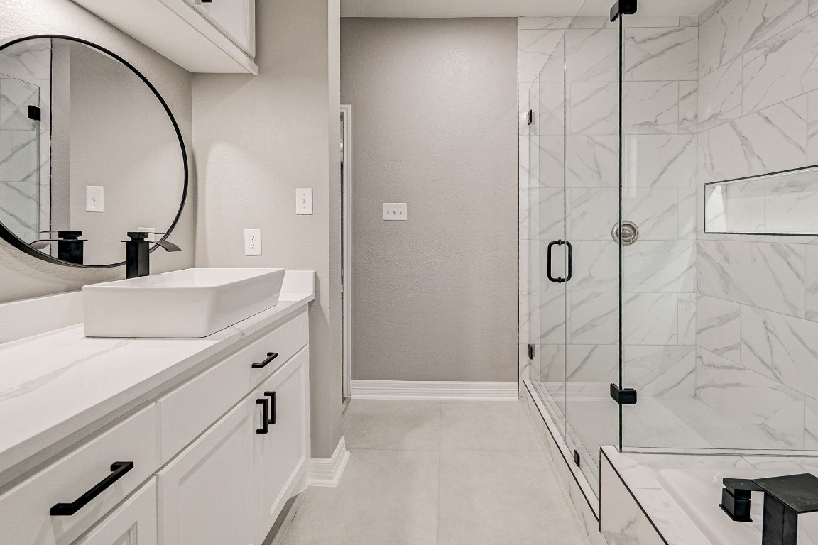 3306 Gary Lane Spring, TX 77380 - Photo 26 of 49 a bathroom with a sink and a mirror