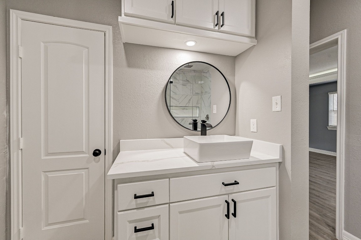 3306 Gary Lane Spring, TX 77380 - Photo 27 of 49 a bathroom with a sink and a mirror