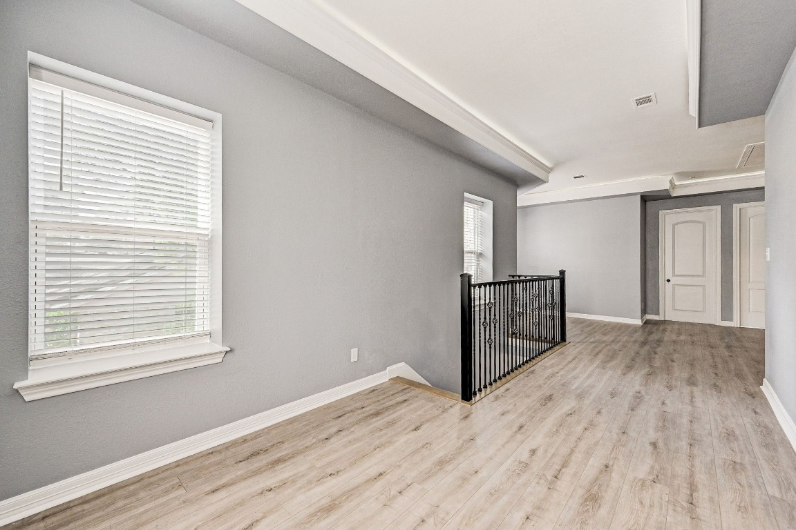 3306 Gary Lane Spring, TX 77380 - Photo 32 of 49 a view of empty room with wooden floor and fan