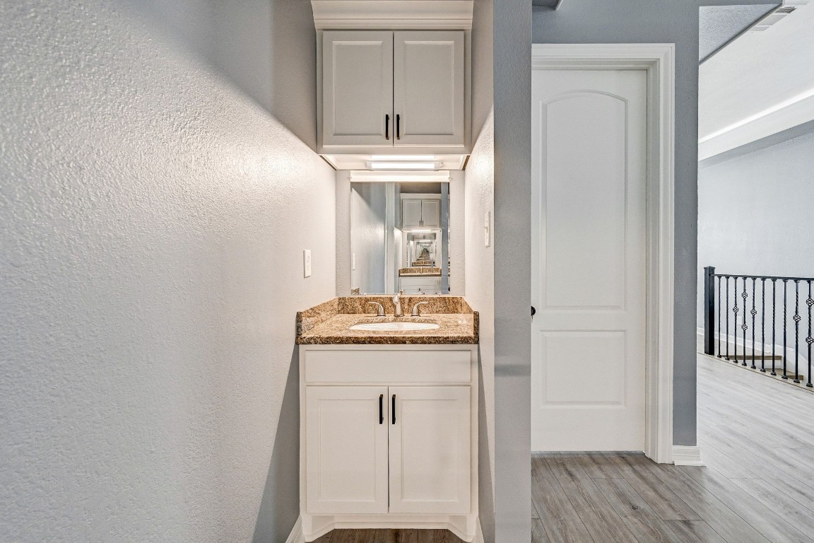 3306 Gary Lane Spring, TX 77380 - Photo 36 of 49 a bathroom with a granite countertop sink and a mirror