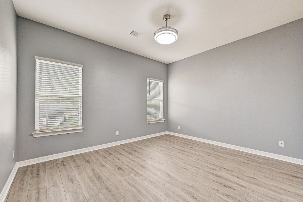 3306 Gary Lane Spring, TX 77380 - Photo 43 of 49 a view of an empty room with wooden floor and a window