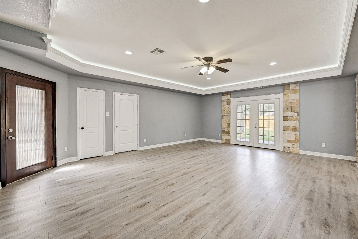 3306 Gary Lane Spring, TX 77380 - Photo 9 of 49 a view of an empty room with a window and wooden floor