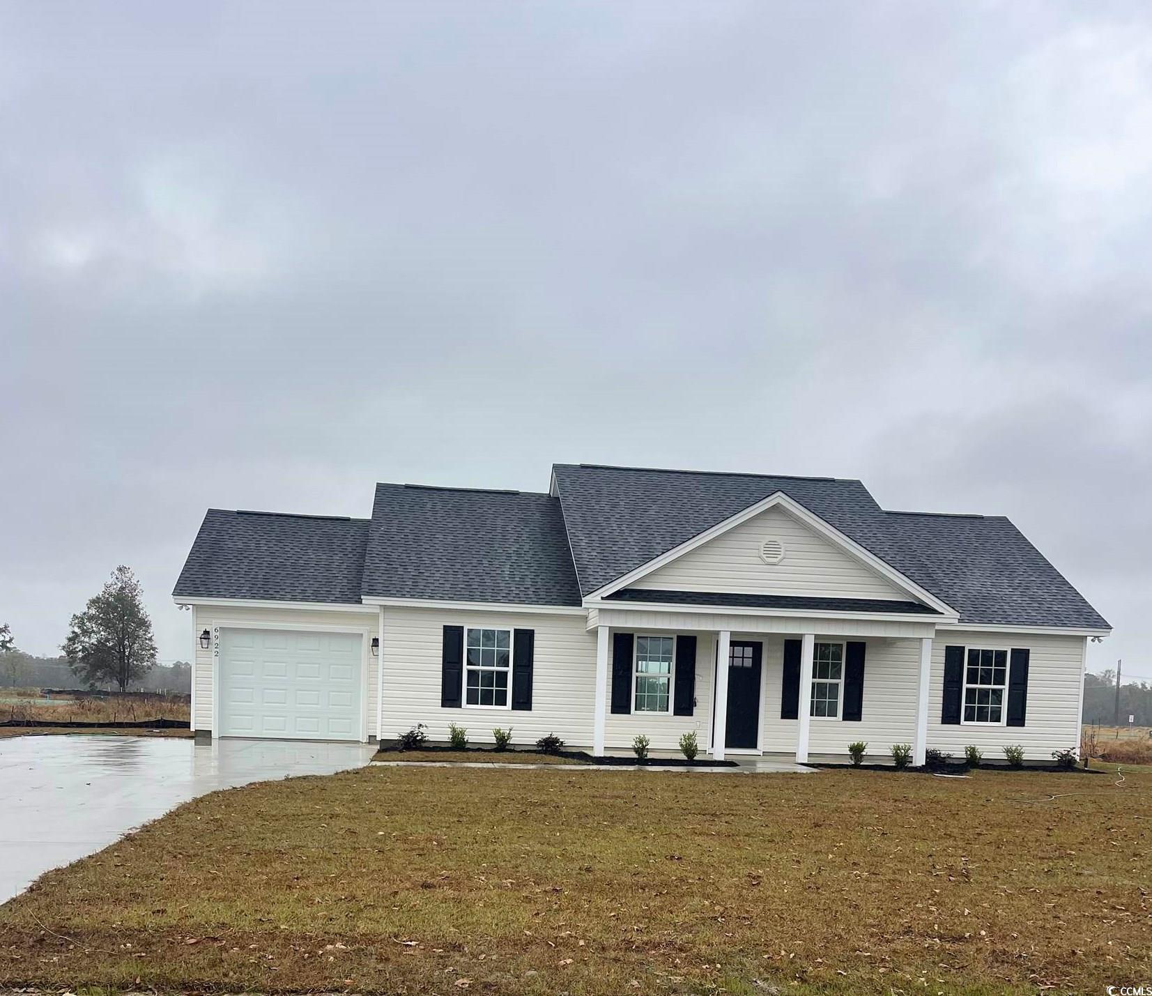 6922 Browns Way Shortcut Road Conway, SC 29527 - Photo 2 of 21 View of front facade featuring a water view, a gar