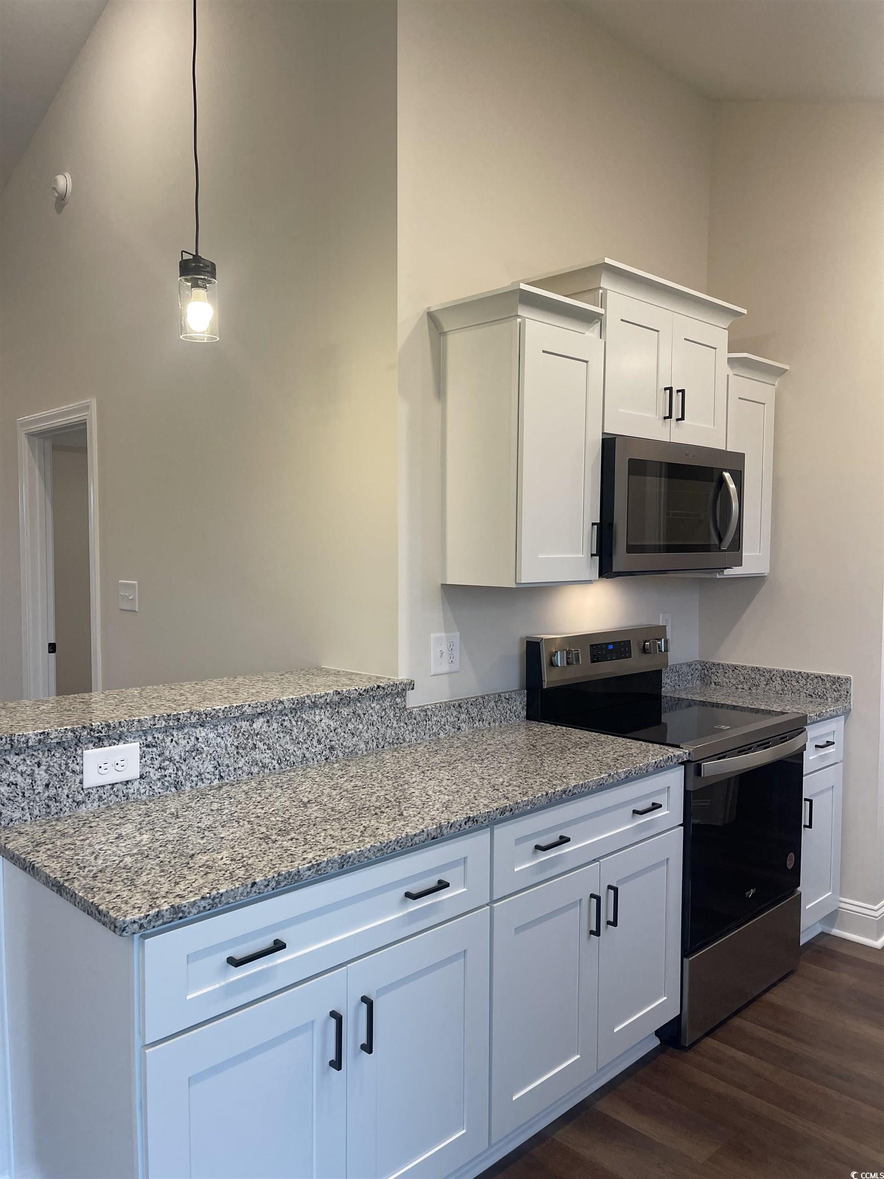6922 Browns Way Shortcut Road Conway, SC 29527 - Photo 5 of 21 Kitchen with white cabinets, dark hardwood / wood-