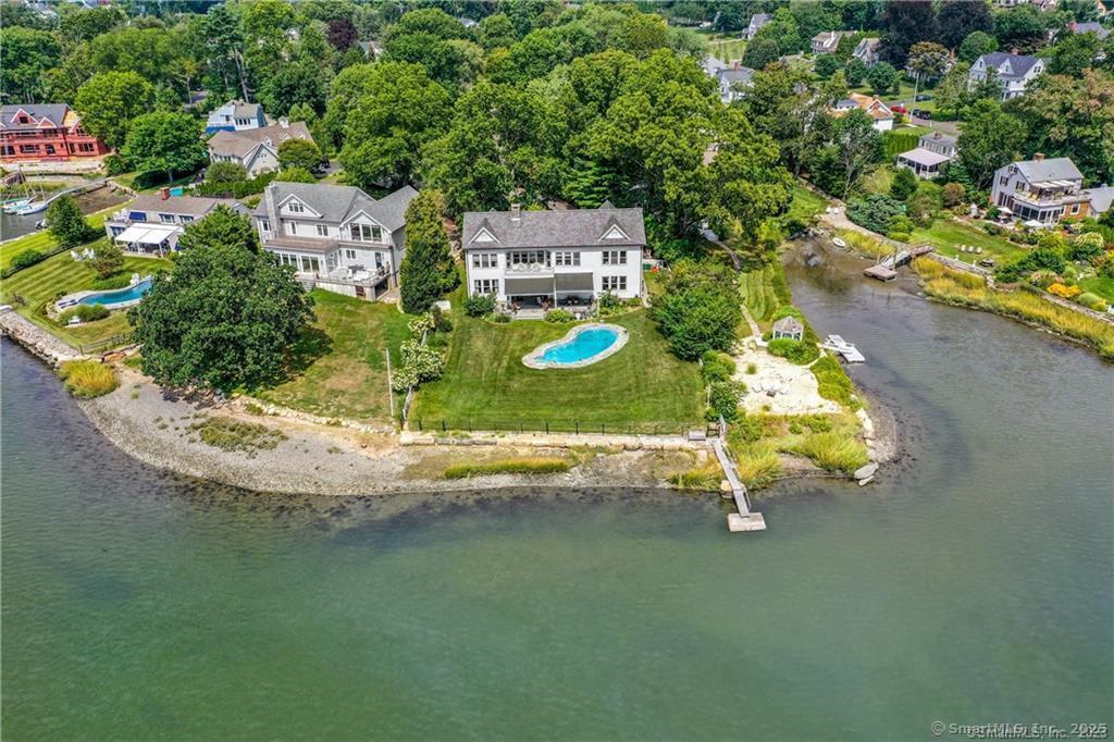 26 Lighthouse Way Darien, CT 06820 - Photo 1 of 1 an aerial view of a house with a yard basket ball court