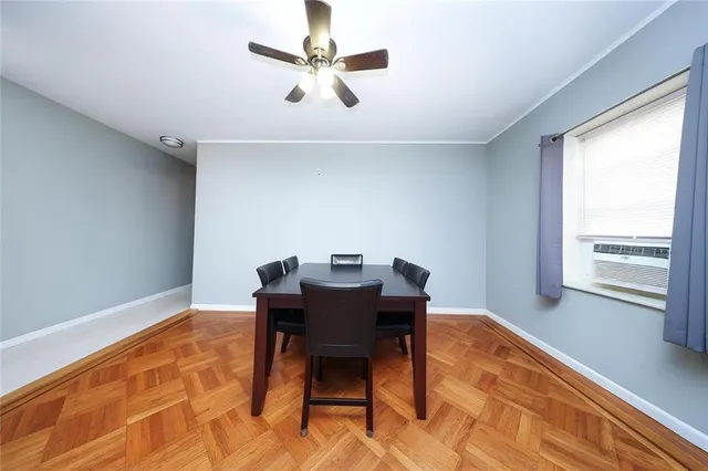 a workspace with furniture and a window