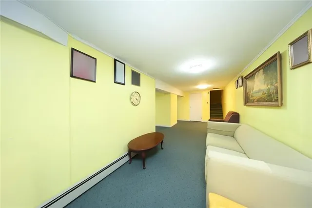 a living room with couch and a table