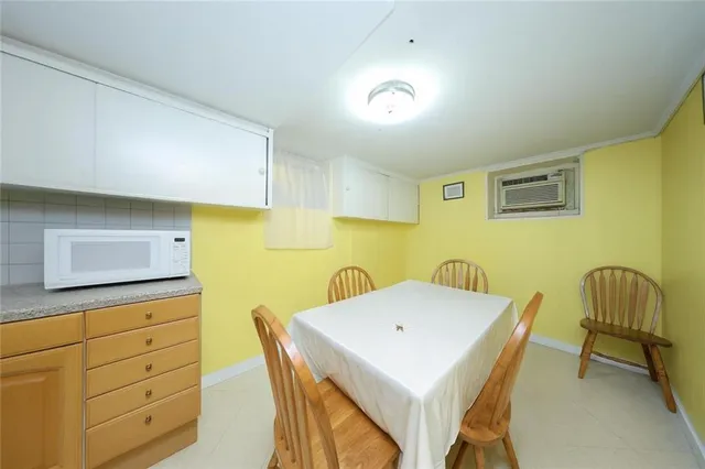 a bedroom with a bed and furniture