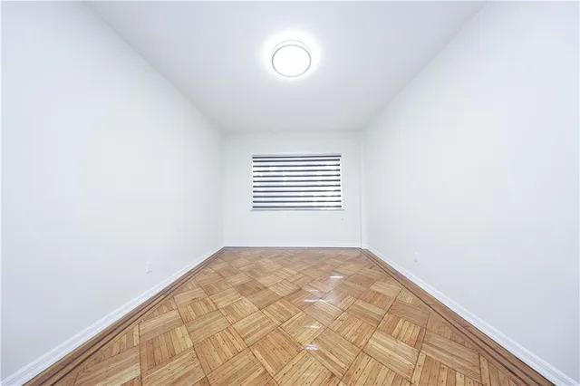 a view of a room with a window