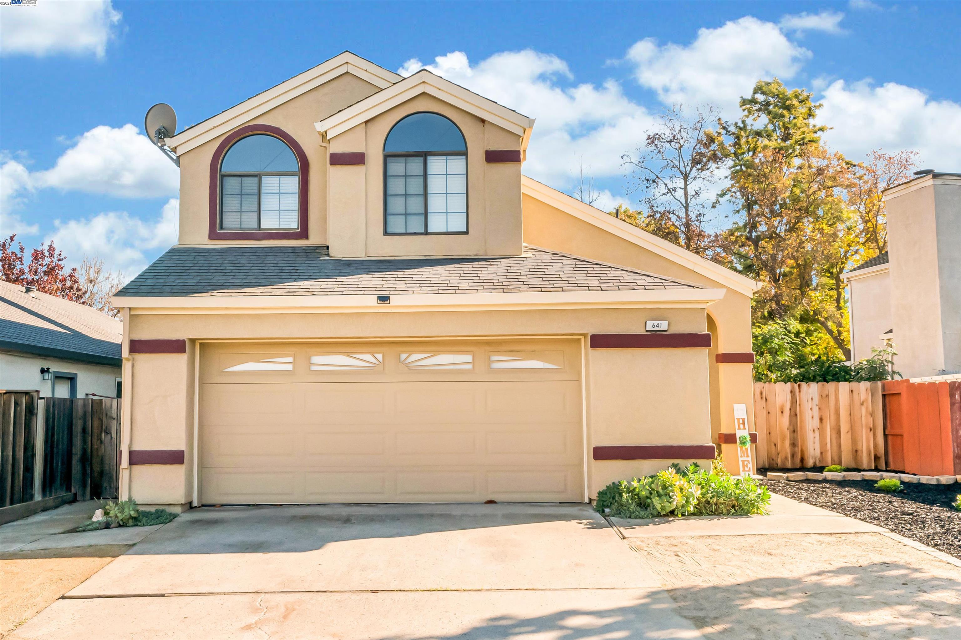641 Mockingbird Lane Oakley, CA 94561 - Photo 1 of 1 a front view of a house with garden