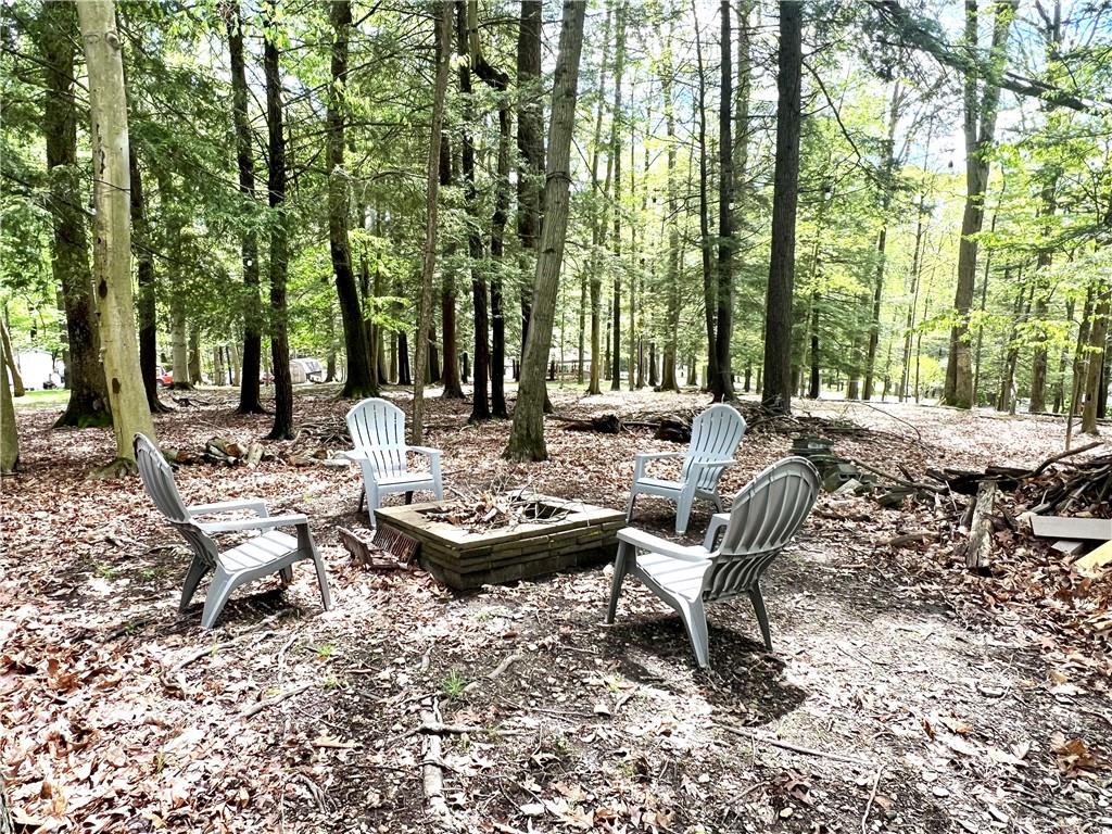 268 Harmony Drive Flinton, PA 16640 - Photo 5 of 19 a view of a patio with chairs and table