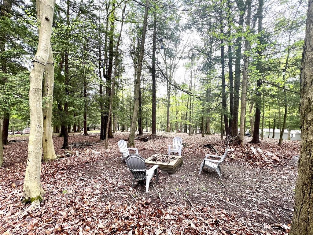 268 Harmony Drive Flinton, PA 16640 - Photo 6 of 19 a view of a backyard with sitting area