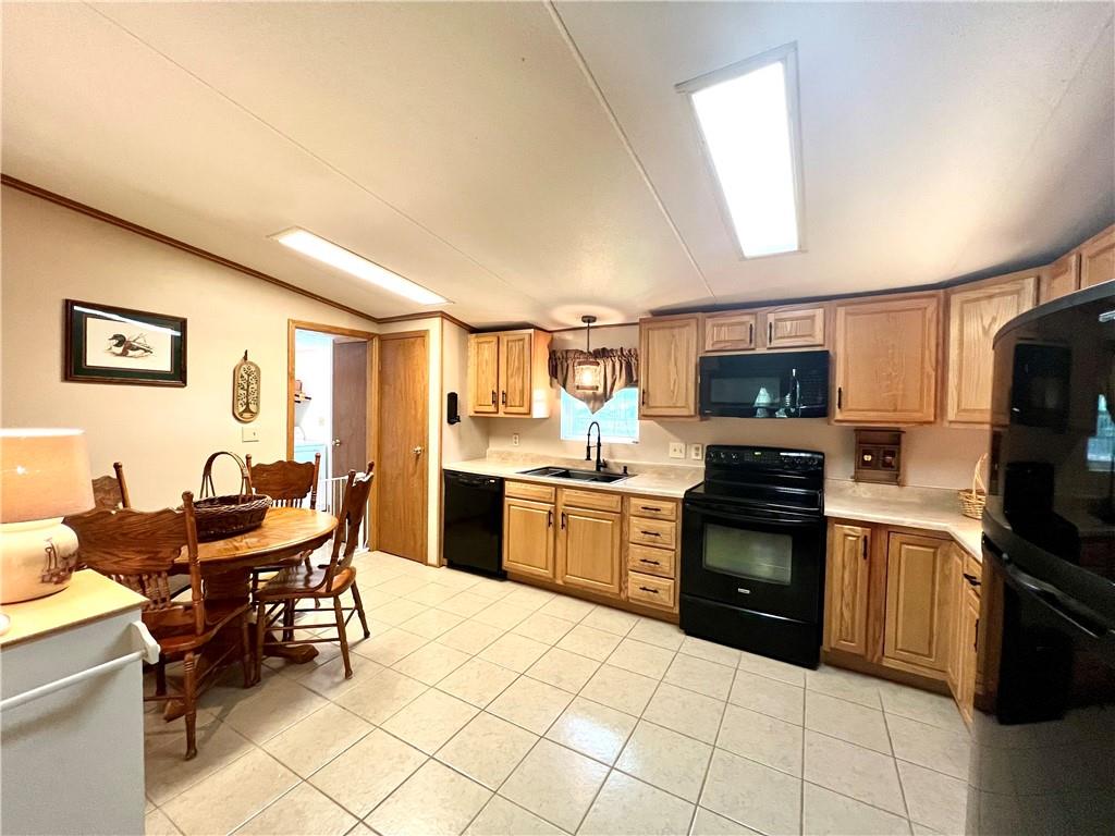 268 Harmony Drive Flinton, PA 16640 - Photo 10 of 19 a kitchen with stainless steel appliances kitchen island granite countertop a sink and cabinets