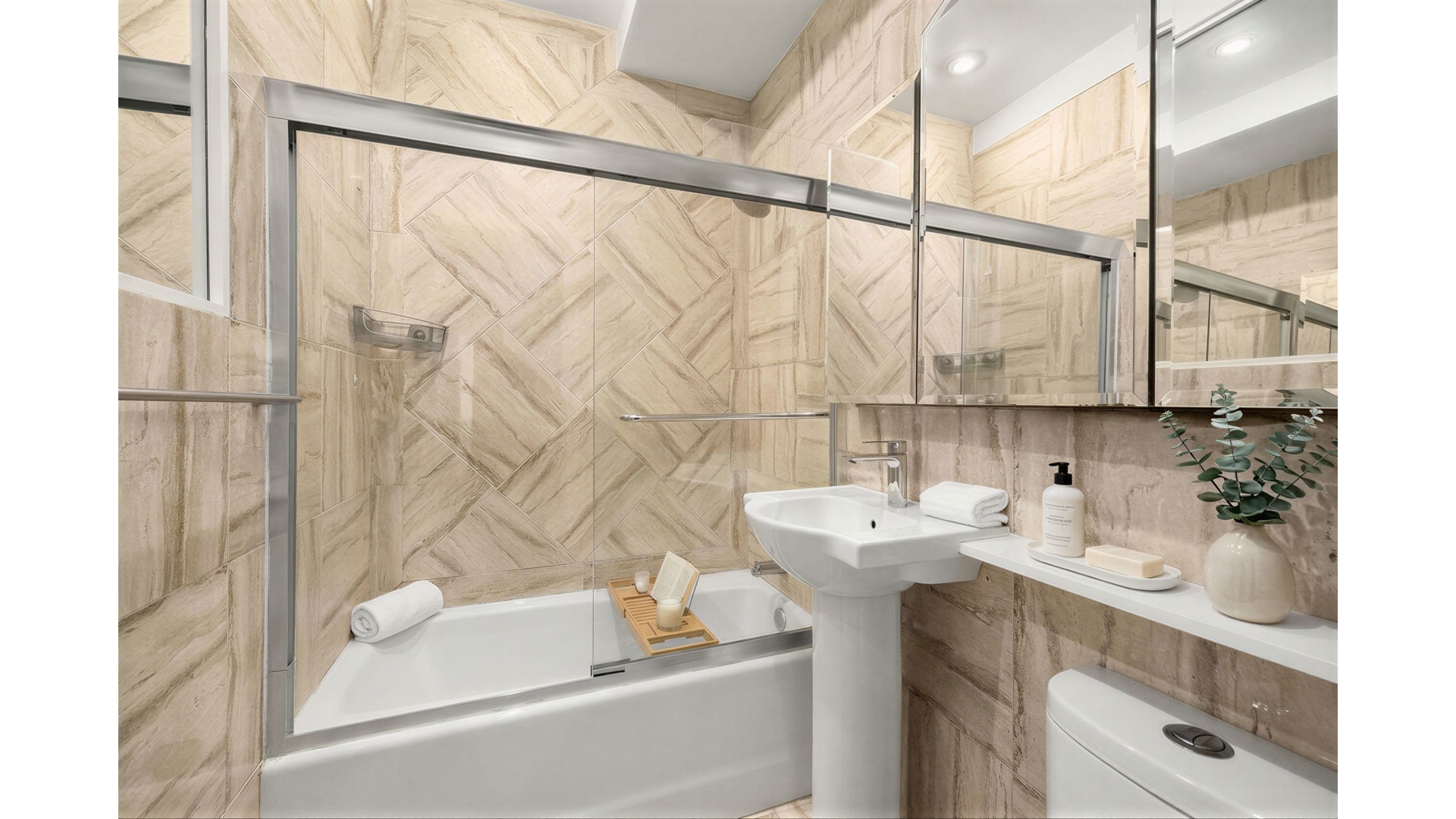 140 7th Avenue, Unit 1P Manhattan, NY 10011 - Photo 8 of 10 a bathroom with a sink and a mirror