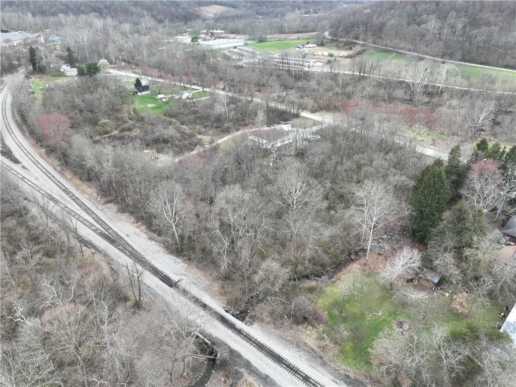 0 New Stanton Ruffsdale Road Ruffs Dale, PA 15679 - Photo 16 of 34 a view of a yard with wooden fence