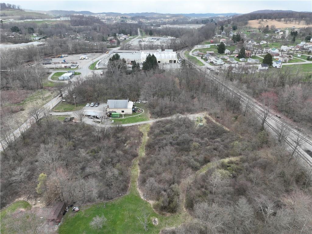 0 New Stanton Ruffsdale Road Ruffs Dale, PA 15679 - Photo 21 of 34 a view of a town with mountains in the background