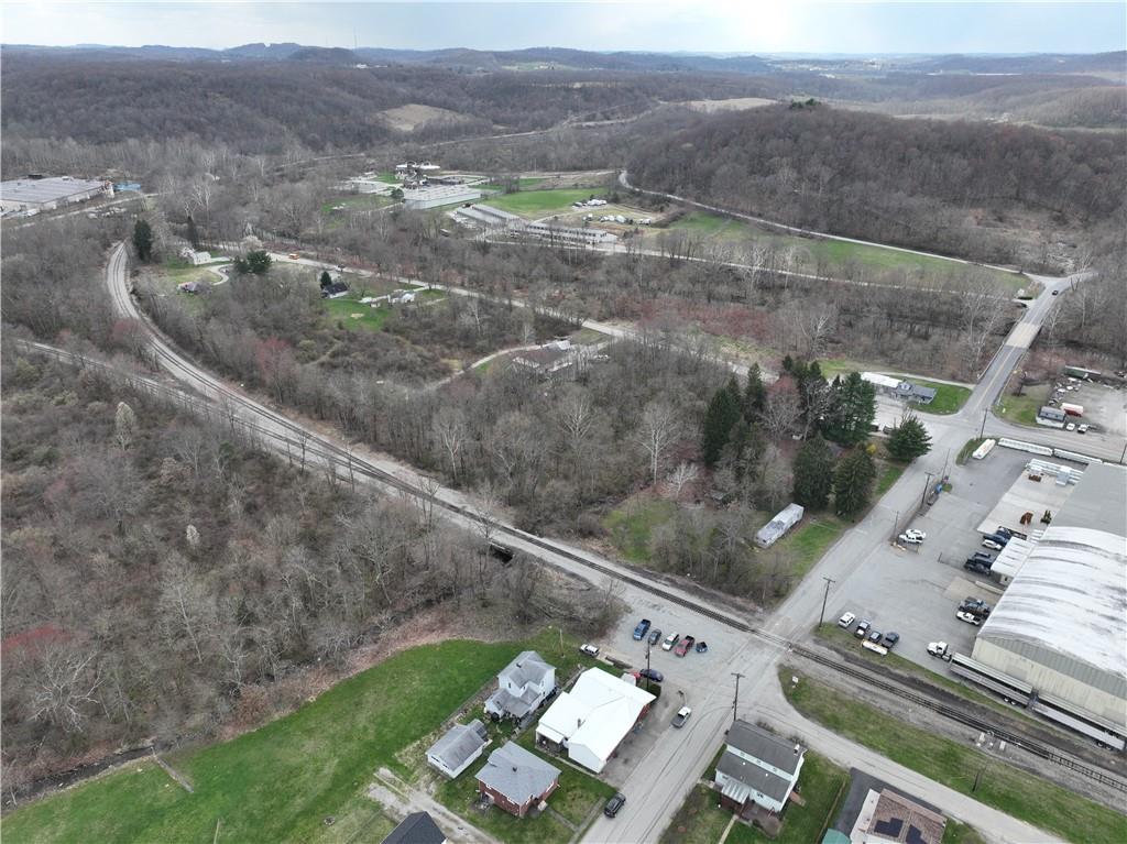 0 New Stanton Ruffsdale Road Ruffs Dale, PA 15679 - Photo 24 of 34 a view of a backyard with sitting area