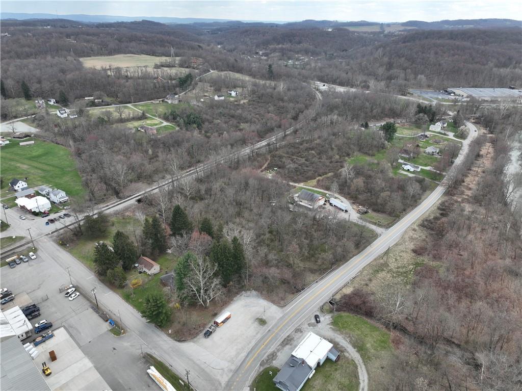 0 New Stanton Ruffsdale Road Ruffs Dale, PA 15679 - Photo 26 of 34 an aerial view of residential houses with outdoor space