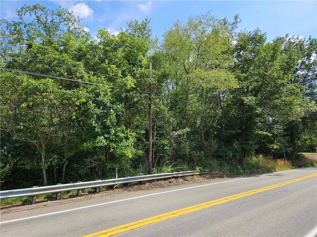 0 New Stanton Ruffsdale Road Ruffs Dale, PA 15679 - Photo 5 of 34 a view of a swimming pool and trees in the background