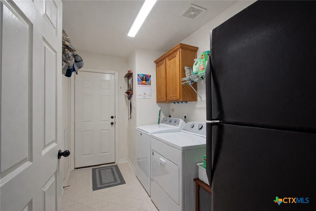 9439 Jeske Road Needville, TX 77461 - Photo 27 of 46 a bathroom with a sink toilet and shower
