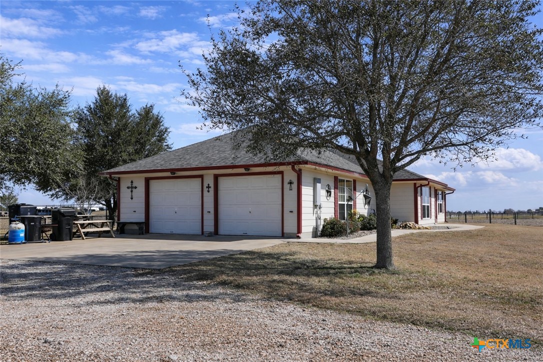9439 Jeske Road Needville, TX 77461 - Photo 9 of 46 a front view of a house with a yard