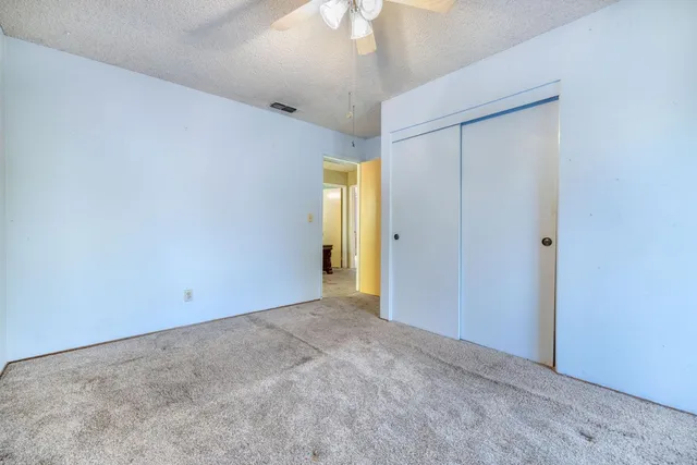 an empty room with a bathroom