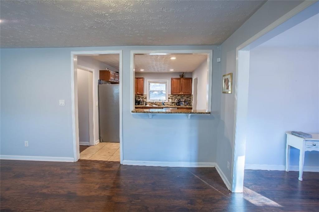 5215 Dixie Lake Road Union City, GA 30291 - Photo 4 of 12 a view of a kitchen cabinets and wooden floor