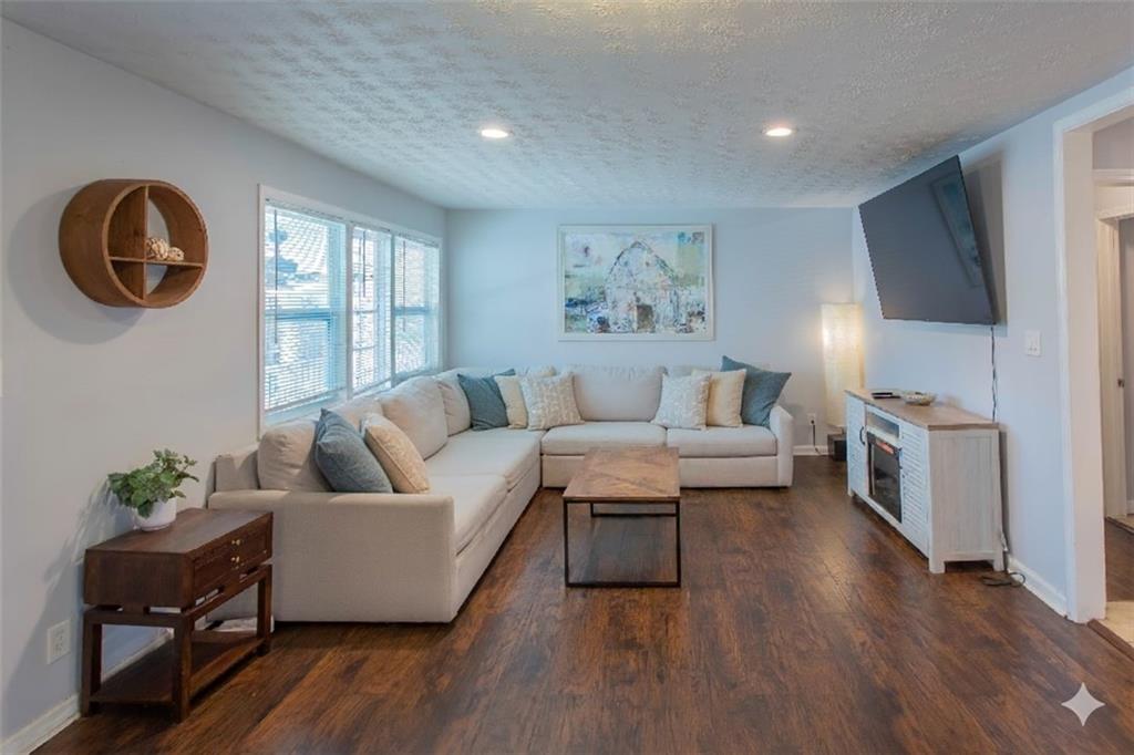 5215 Dixie Lake Road Union City, GA 30291 - Photo 6 of 12 a living room with furniture and a window