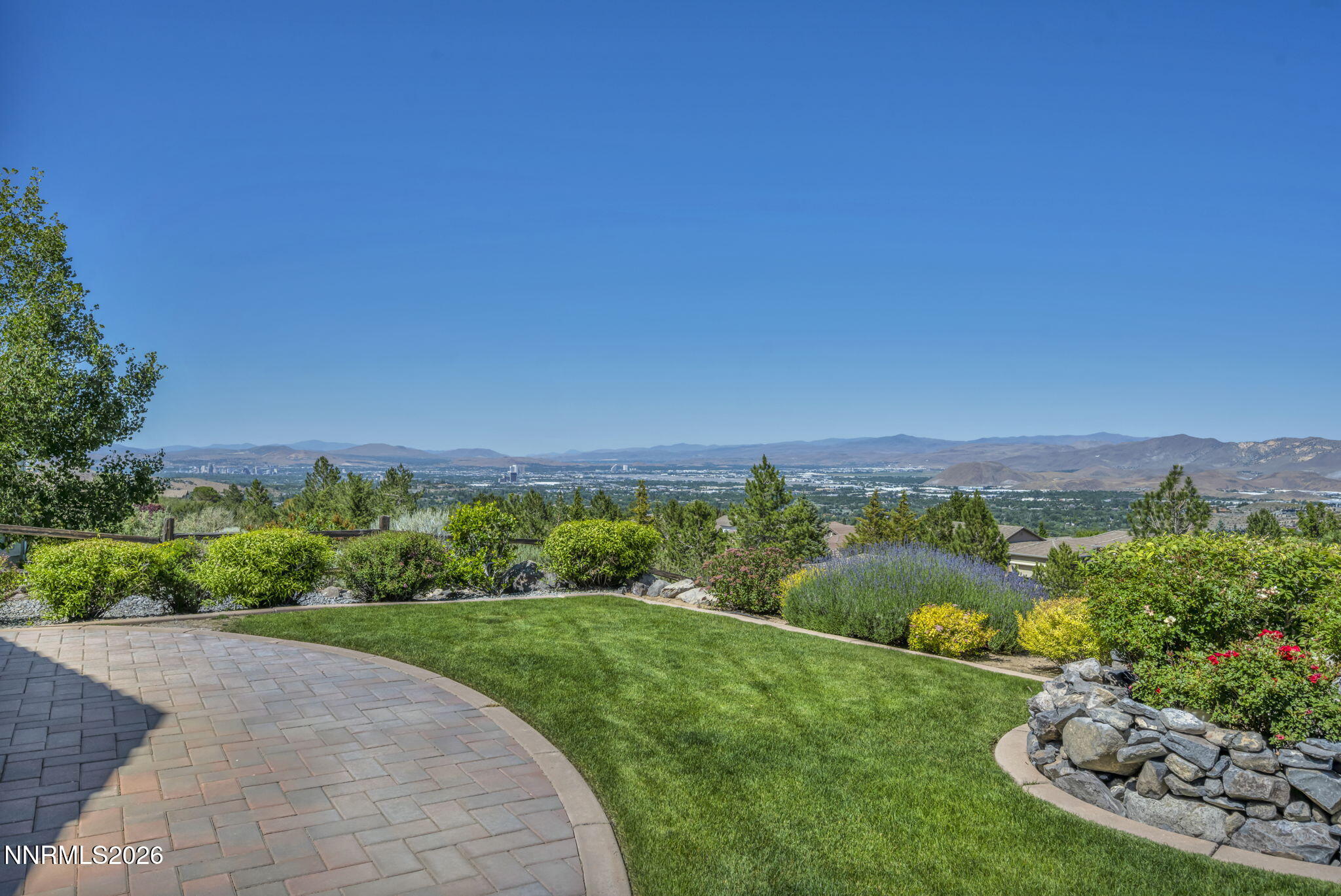 574 Echo Ridge Court Reno, NV 89511 - Photo 1 of 58 a view of a city with sunset view