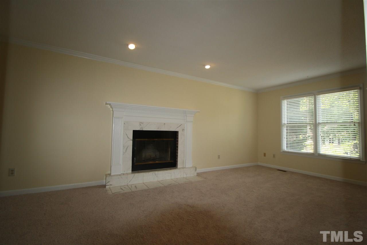 11924 Radner Way Raleigh, NC 27613 - Photo 11 of 25 a view of empty room with a window