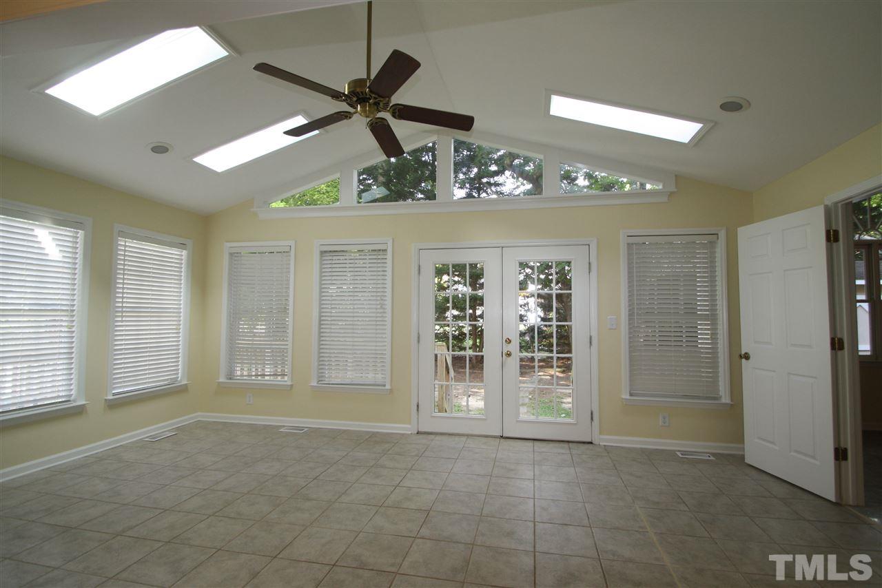 11924 Radner Way Raleigh, NC 27613 - Photo 12 of 25 a view of an empty room with a window