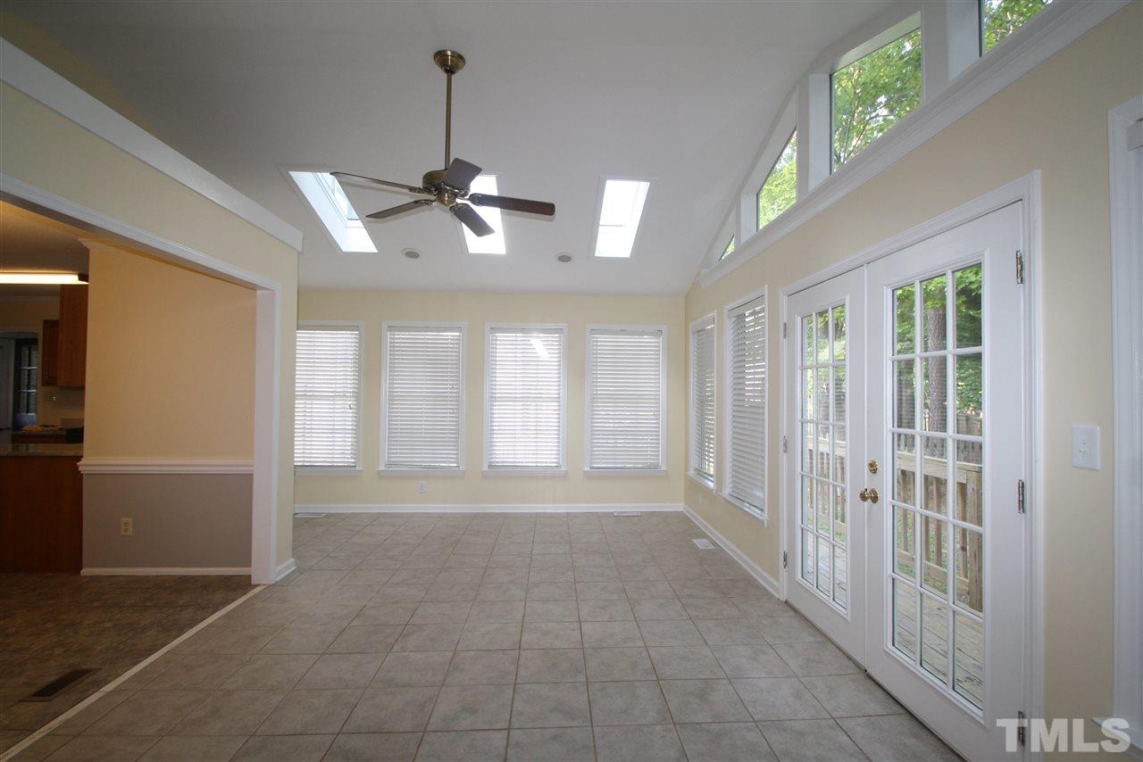 11924 Radner Way Raleigh, NC 27613 - Photo 13 of 25 a view of an empty room with a window