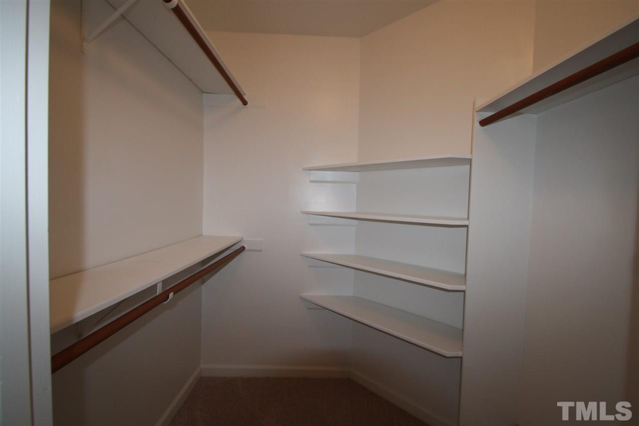 11924 Radner Way Raleigh, NC 27613 - Photo 17 of 25 a view of an empty walk in closet