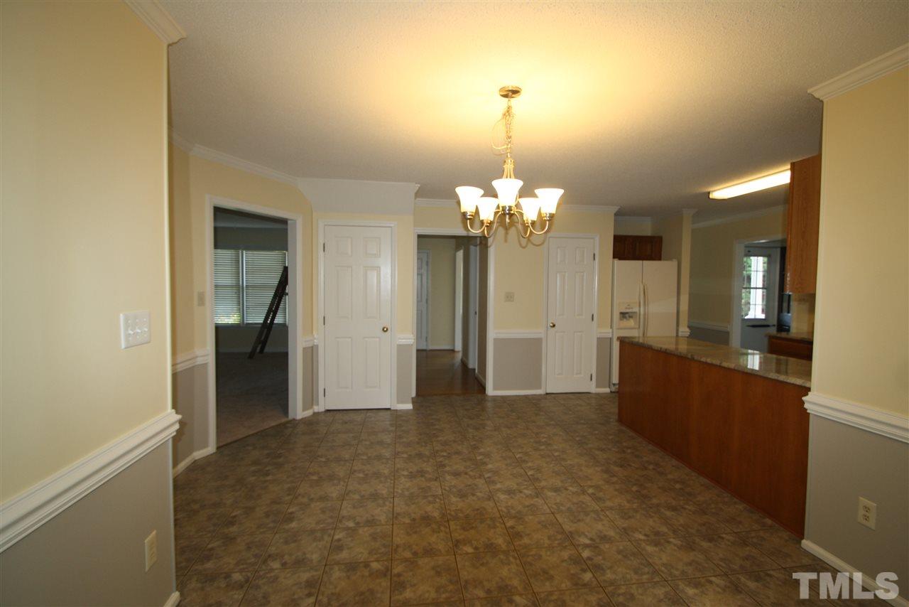 11924 Radner Way Raleigh, NC 27613 - Photo 7 of 25 a view of a chandelier in a room
