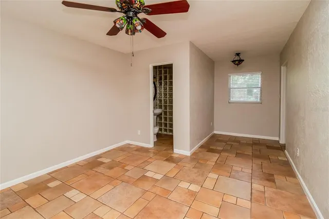 a view of an empty room and window