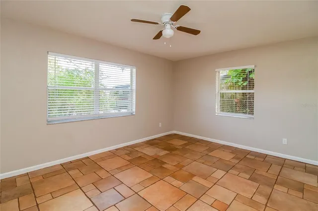 a view of an empty room and window