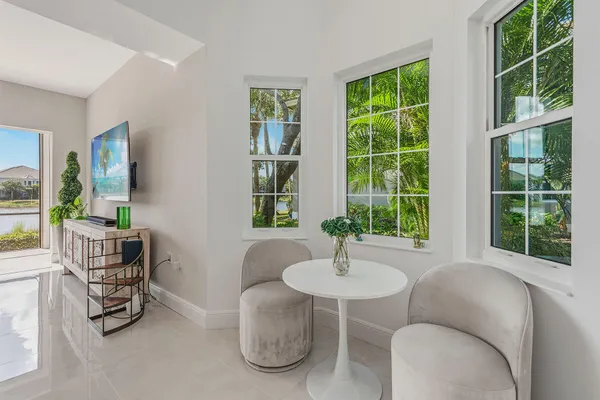 a living room with furniture and a window