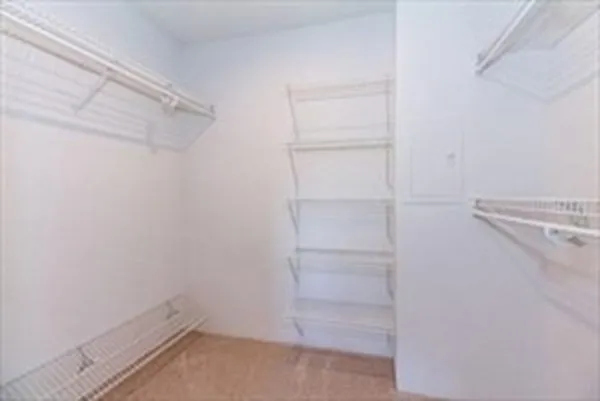 a view of an empty walk in closet