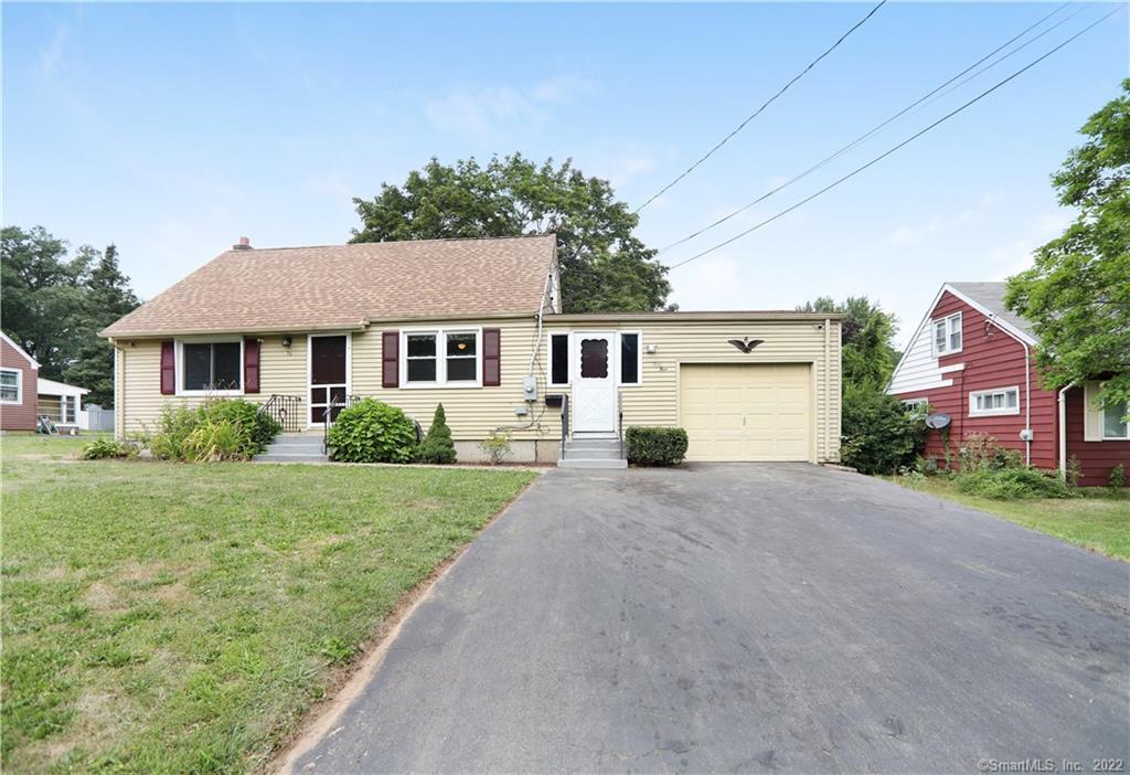 Move in ready 3/4 bedroom cape with room between garage and house.