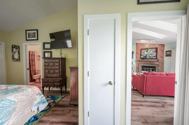 a bedroom with a bed and furniture