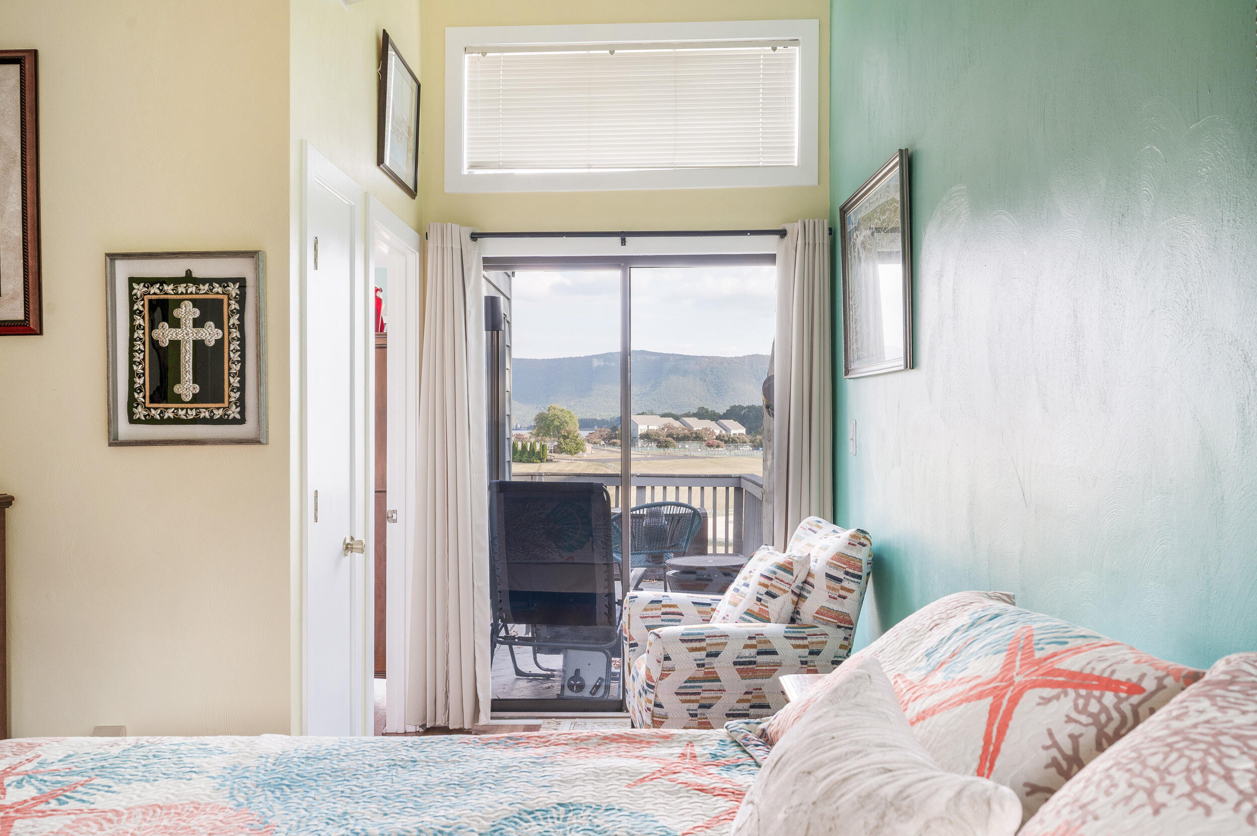 150 Sailor's Cove Drive, Unit 1218 Moneta, VA 24121 - Photo 20 of 56 a bedroom with a bed and a large window