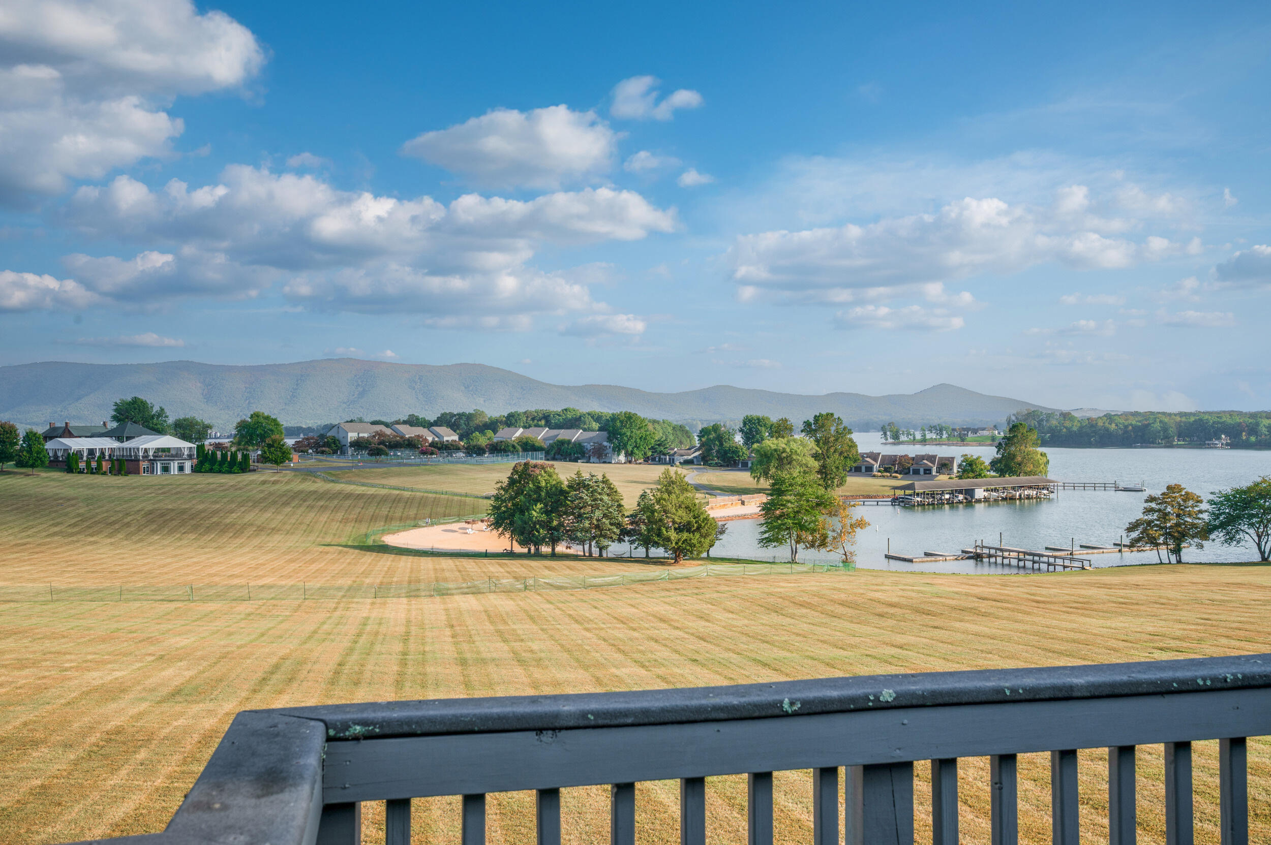 150 Sailor's Cove Drive, Unit 1218 Moneta, VA 24121 - Photo 25 of 56 a view of swimming pool with an ocean view